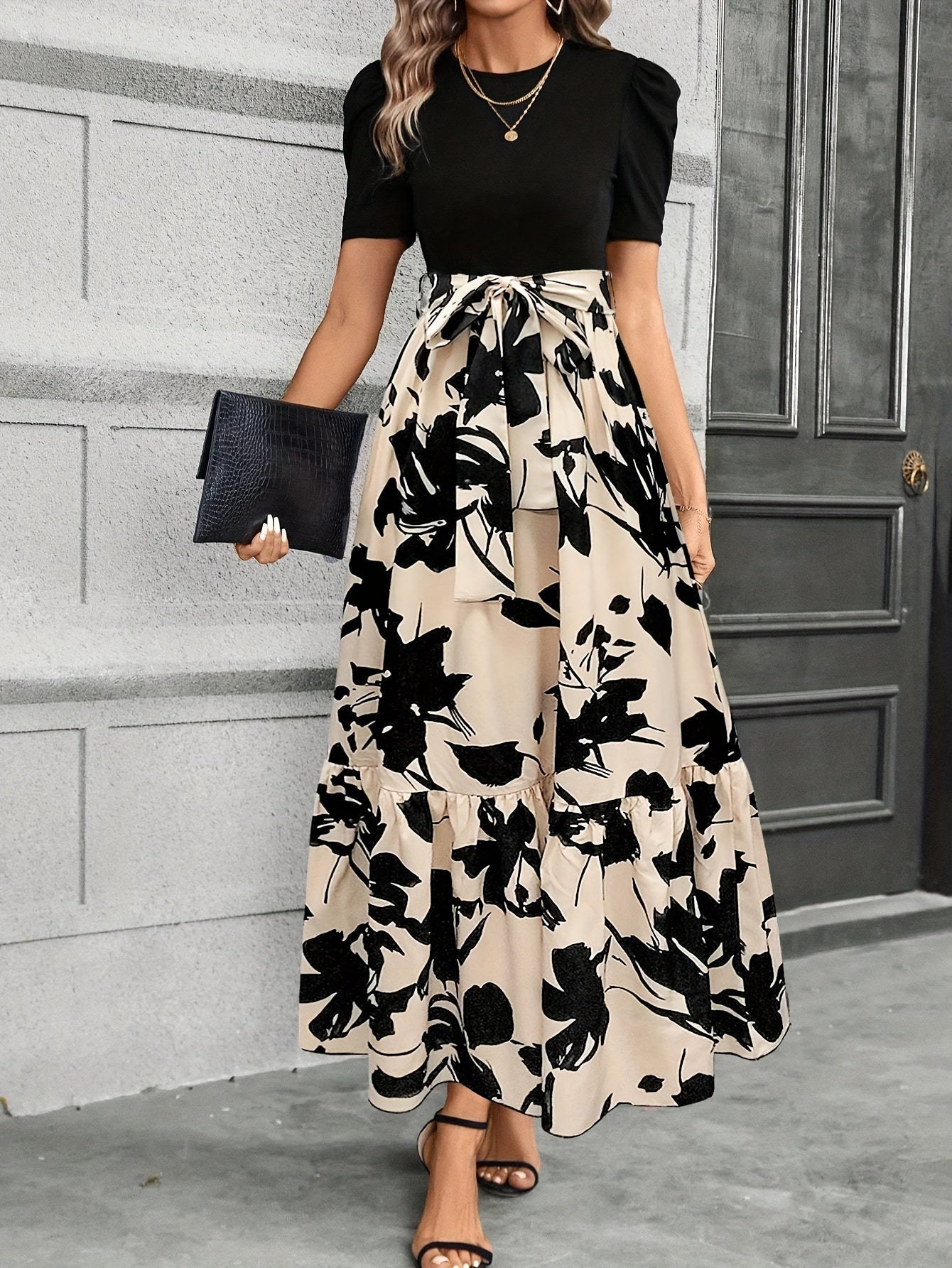 Floral maxi dress with tiered design and puff sleeves
