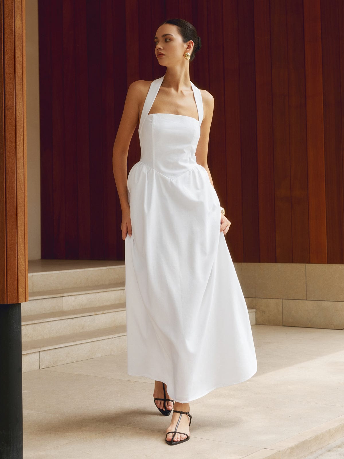 A halter neck sleeveless maxi summer dress perfect for the beach or casual summer wear