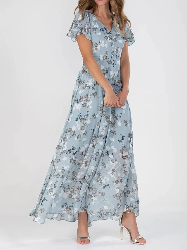 Elegant women's maxi dress in pink floral chiffon design