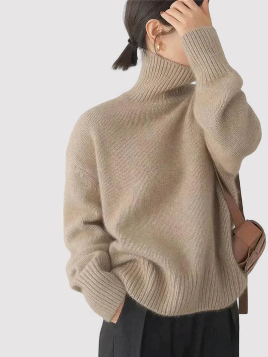 Elegant women's cashmere turtleneck sweater in a soft, luxurious fabric