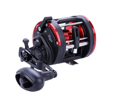 A high-quality baitcaster fishing reel among essential fishing equipment and accessories